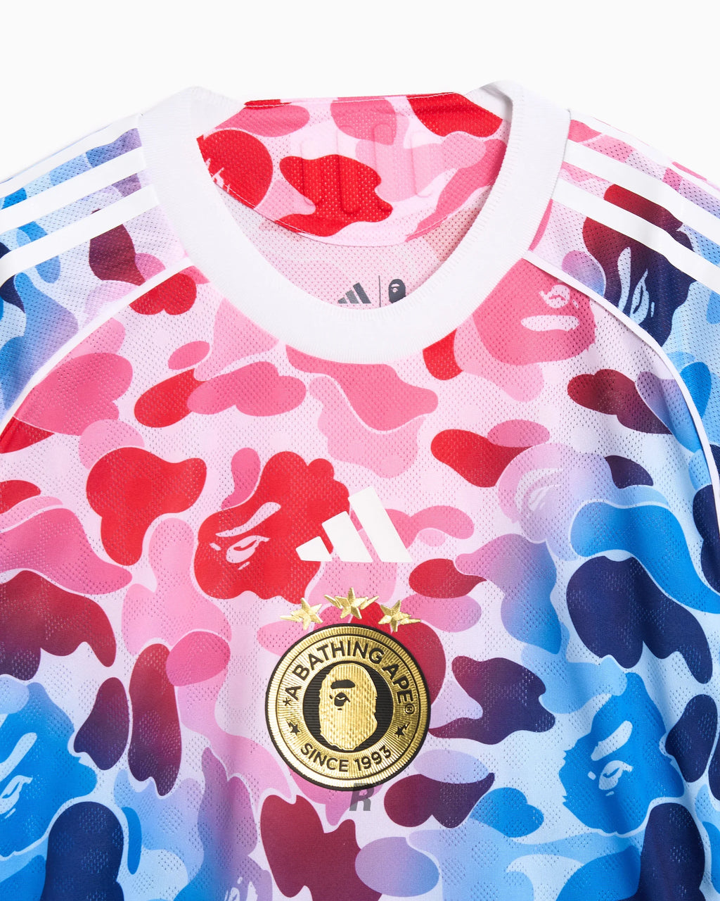 A collector’s dream — the Bape Pink Football Jersey combines BAPE’s signature camo with Adidas performance.