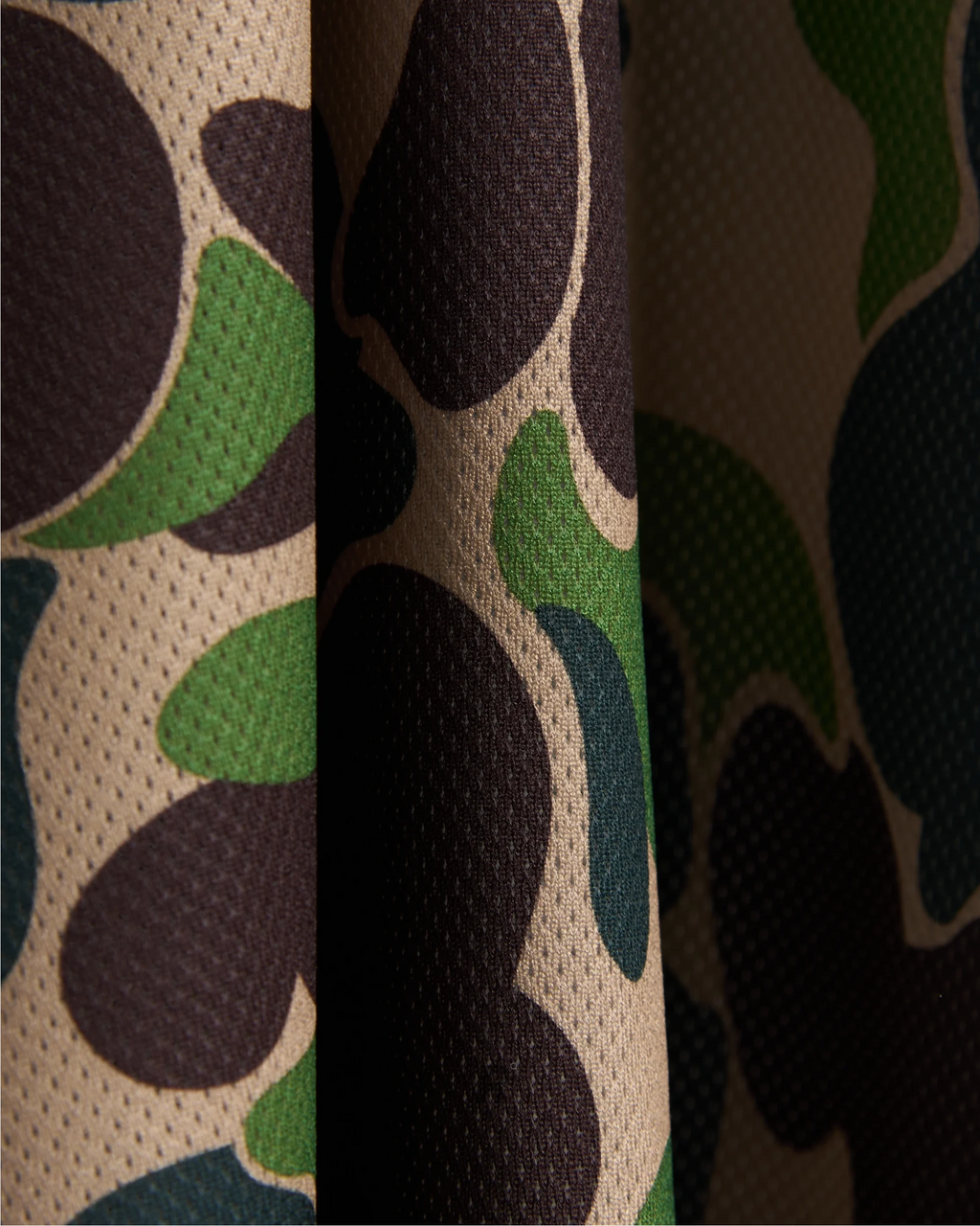 Built for bold players. The Bape Green Football Jersey combines comfort, culture, and creativity.