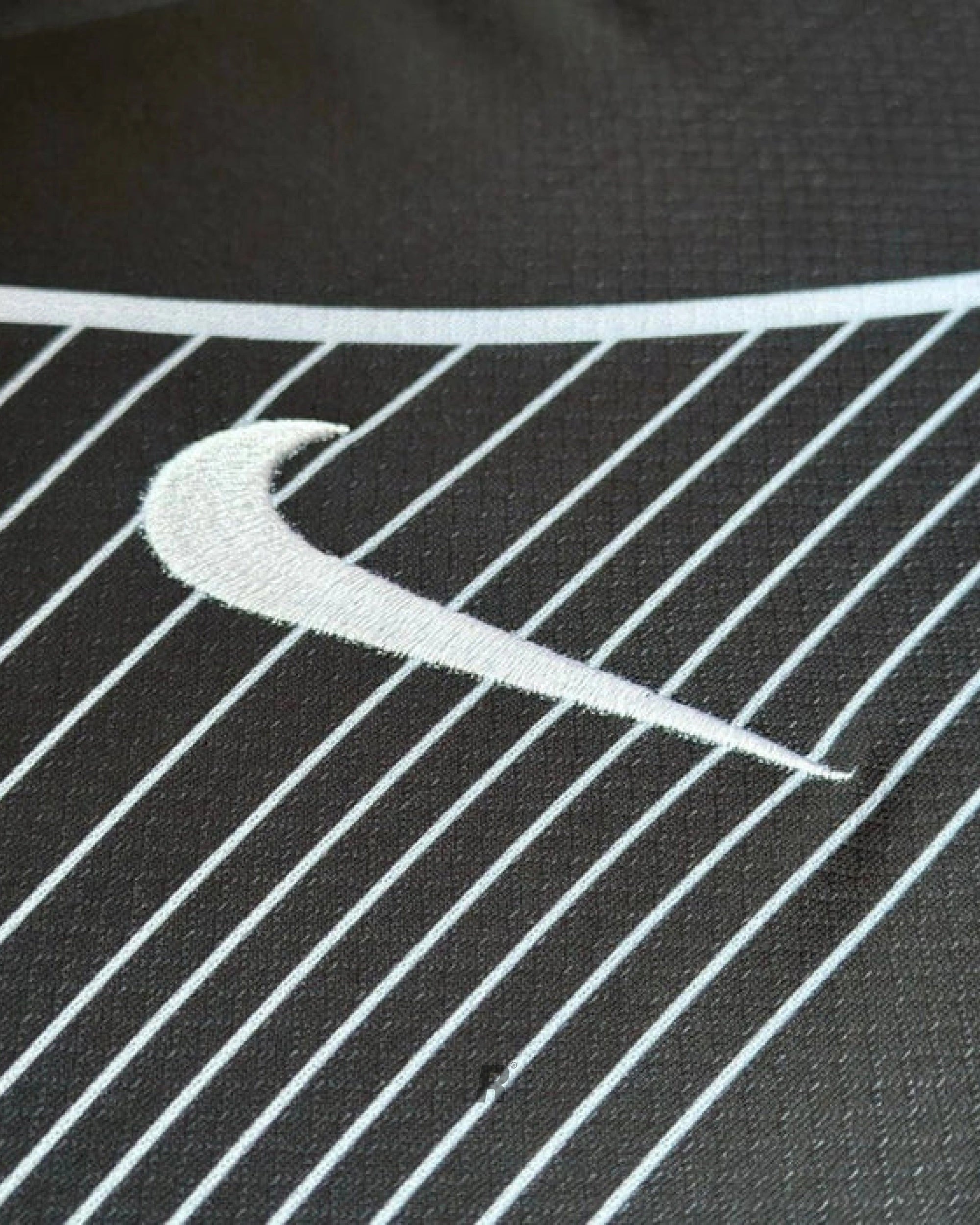 Styled view of the Barcelona Black Special Edition Jersey, showcasing its sleek black design and premium detailing, perfect for display or gifting.