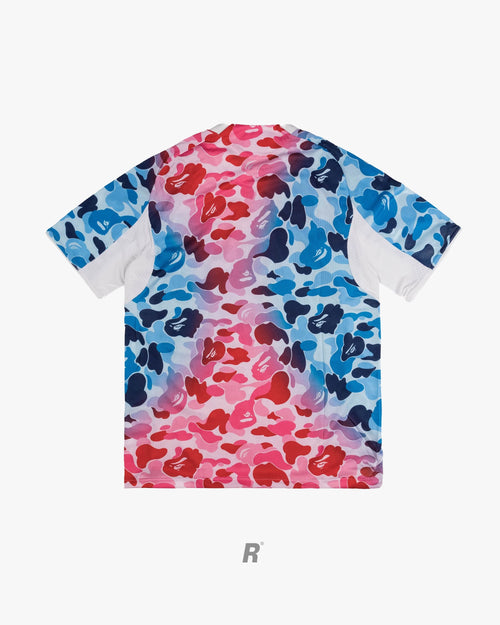 Stand out in pink camo. The Bape Pink Football Jersey captures the fearless spirit of modern fashion.