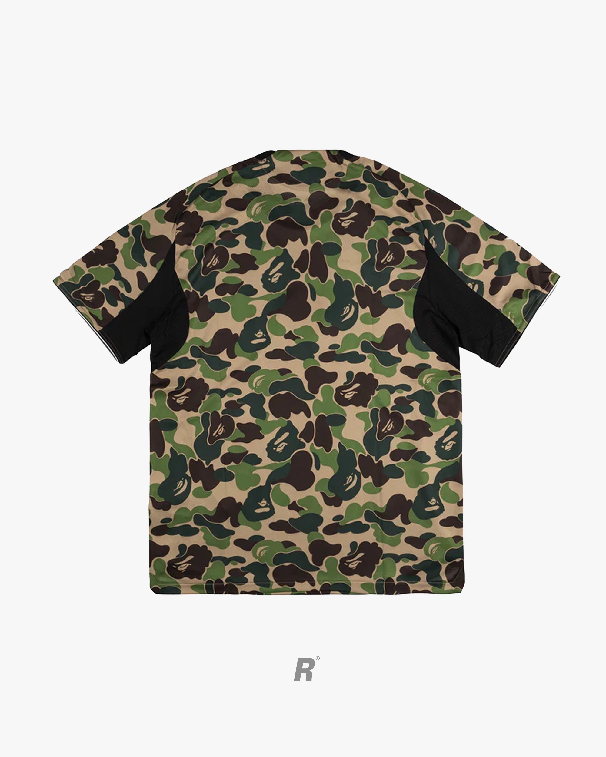 Green camo perfection. The Bape Green Football Jersey delivers street luxury on and off the pitch.